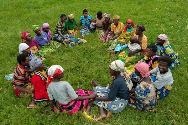 SHG Formation A newly formed self help group near Nyamagabe sit in a circle for the first time.